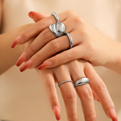 Design sense: simple hugging, smooth curved ring, layered style, niche geometric rings